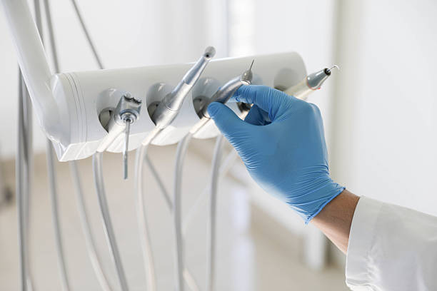 Professional Emergency Dentist technician working in Flora, MS